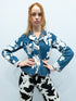 Denimjakke fra Vivienne Westwood med store hvide blomster og peplum